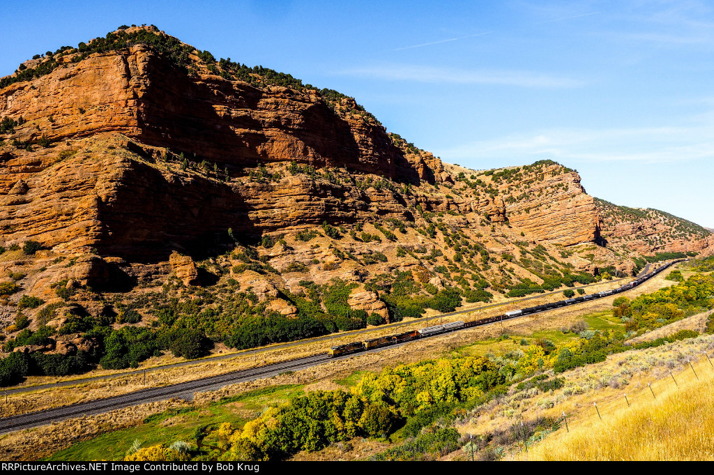 UP 8738 leads westbound manifest freight down Echo Canyon